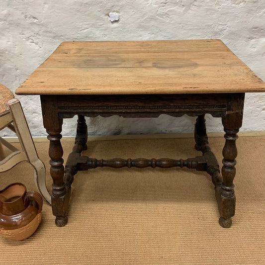 Oak stretcher-base side table