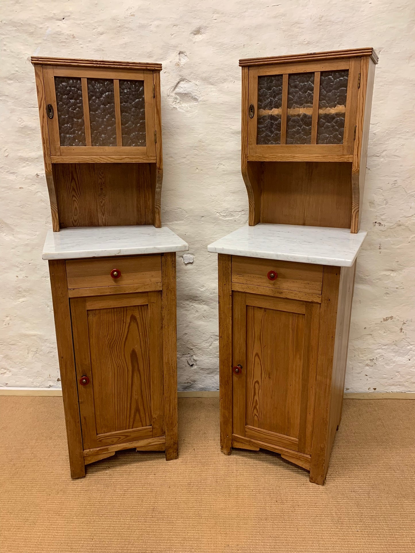 A Pair of Marble Topped Cabinets