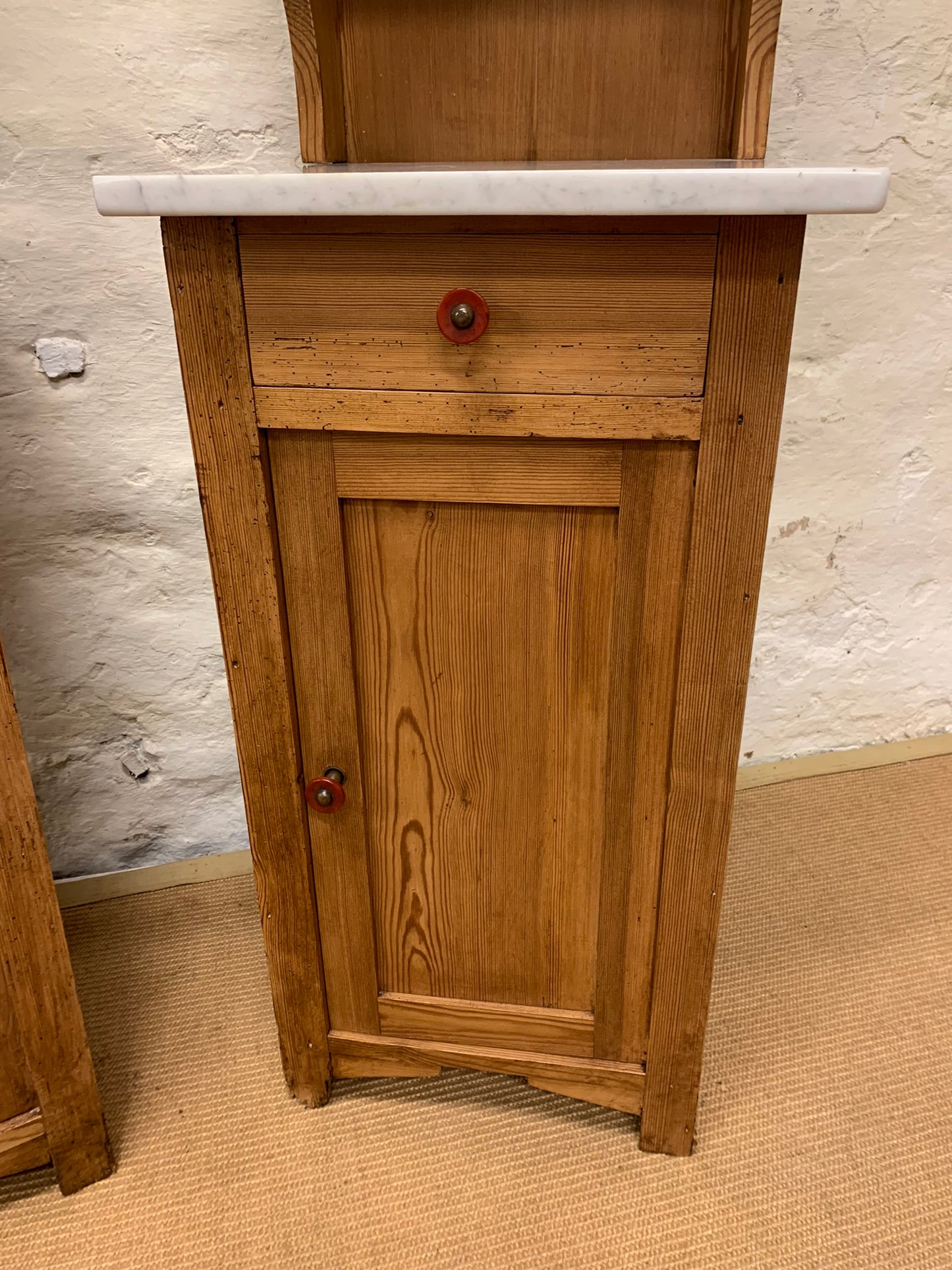 A Pair of Marble Topped Cabinets