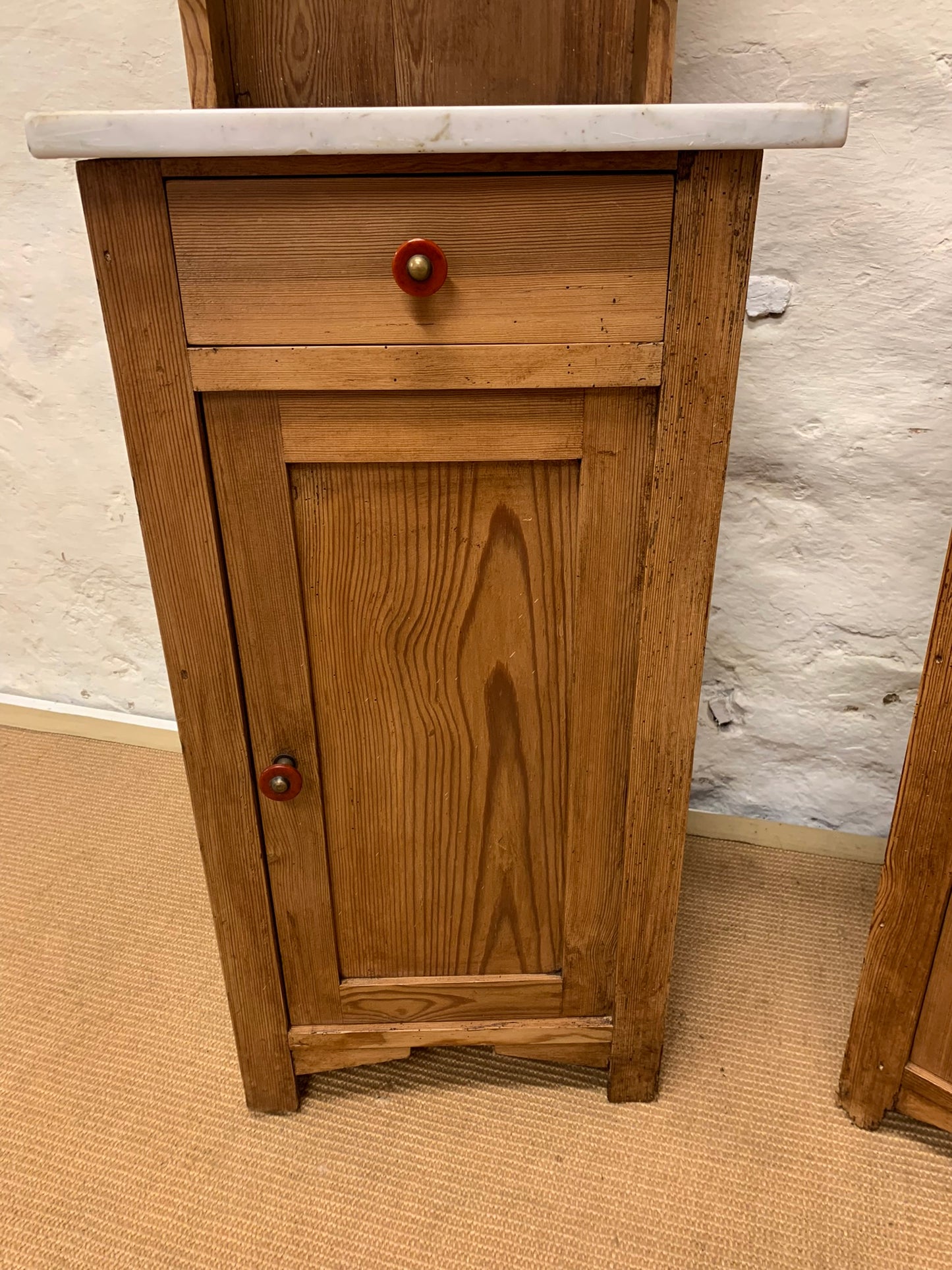A Pair of Marble Topped Cabinets