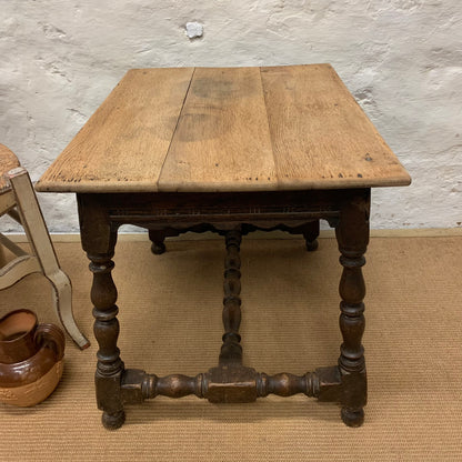 Oak stretcher-base side table