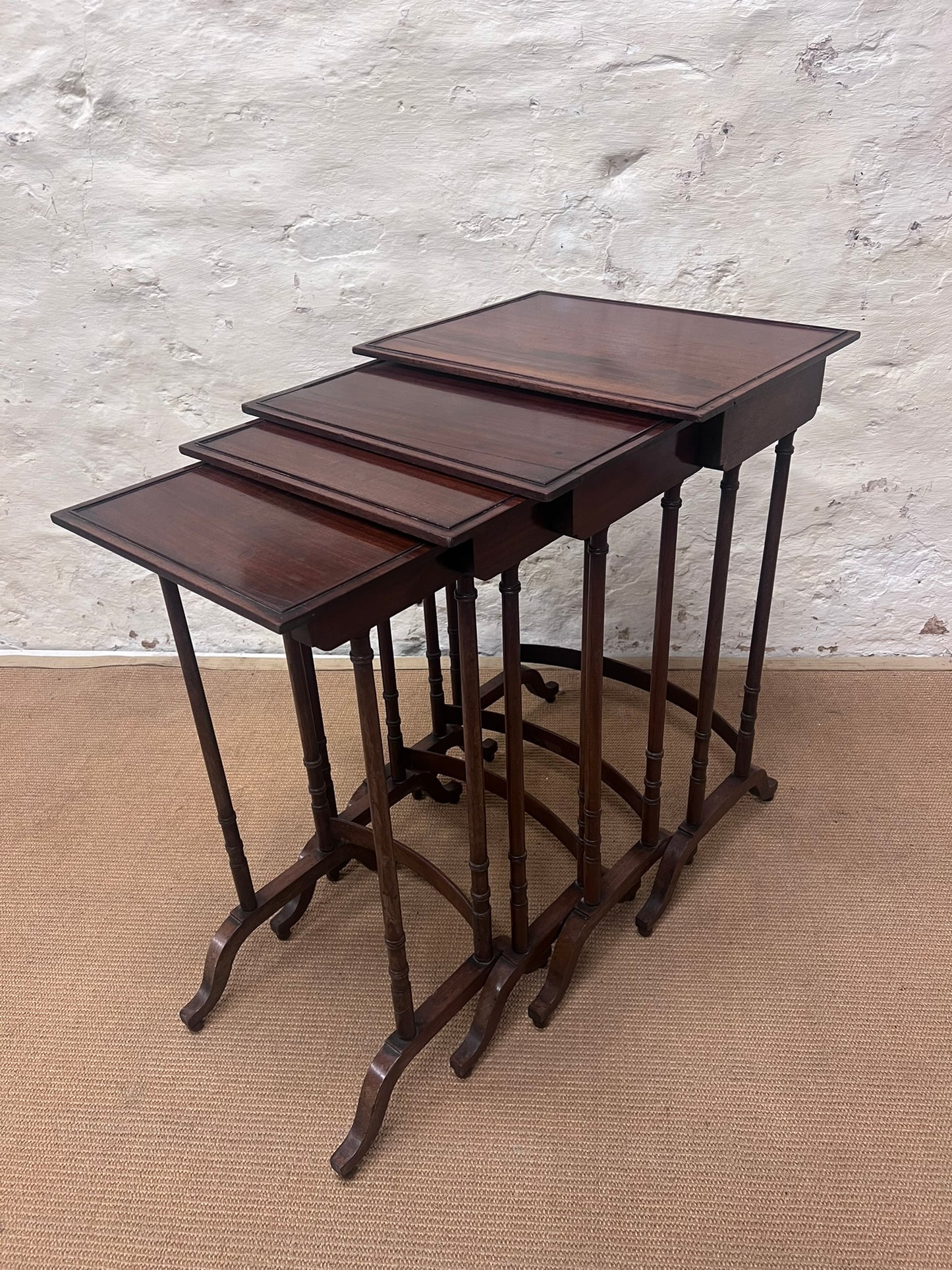 Nest of 4 Mahogany Tables