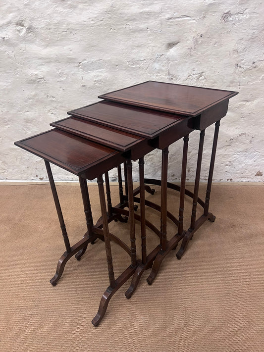 Nest of 4 Mahogany Tables
