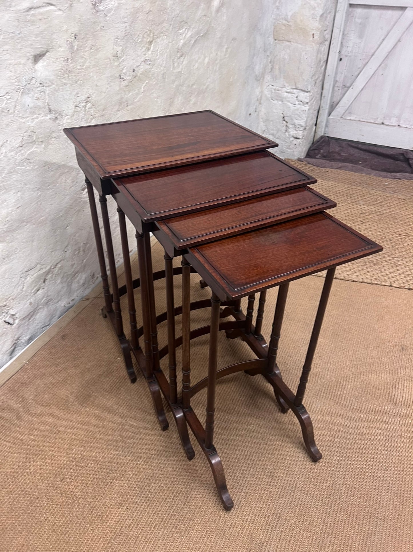 Nest of 4 Mahogany Tables