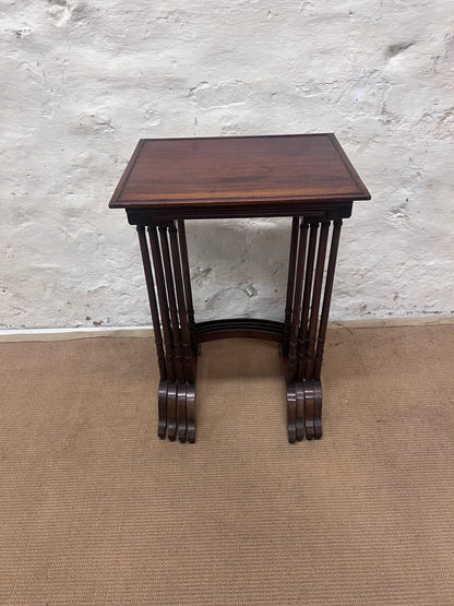 Nest of 4 Mahogany Tables