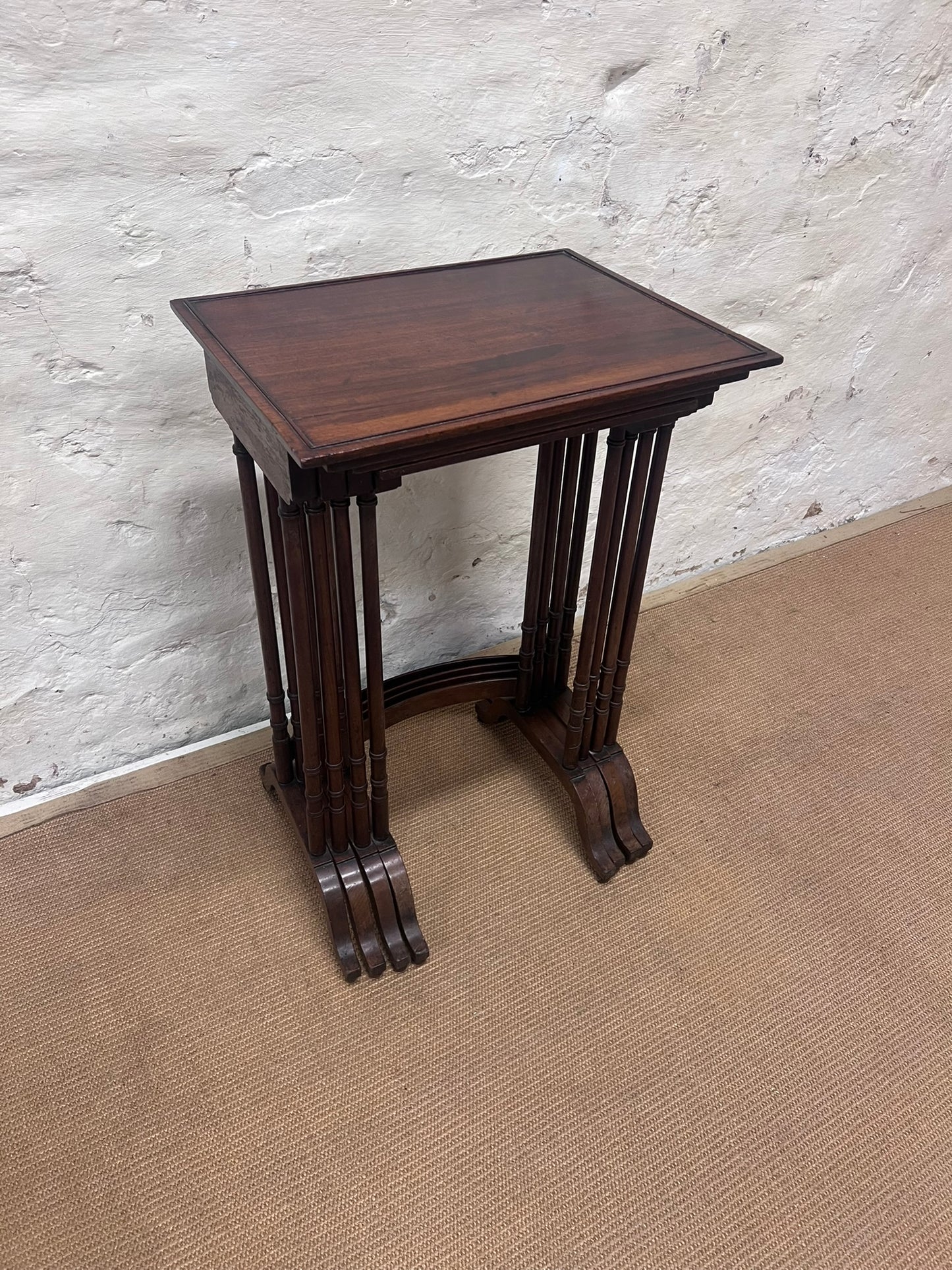 Nest of 4 Mahogany Tables