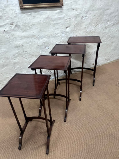 Nest of 4 Mahogany Tables