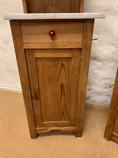 A Pair of Marble Topped Cabinets