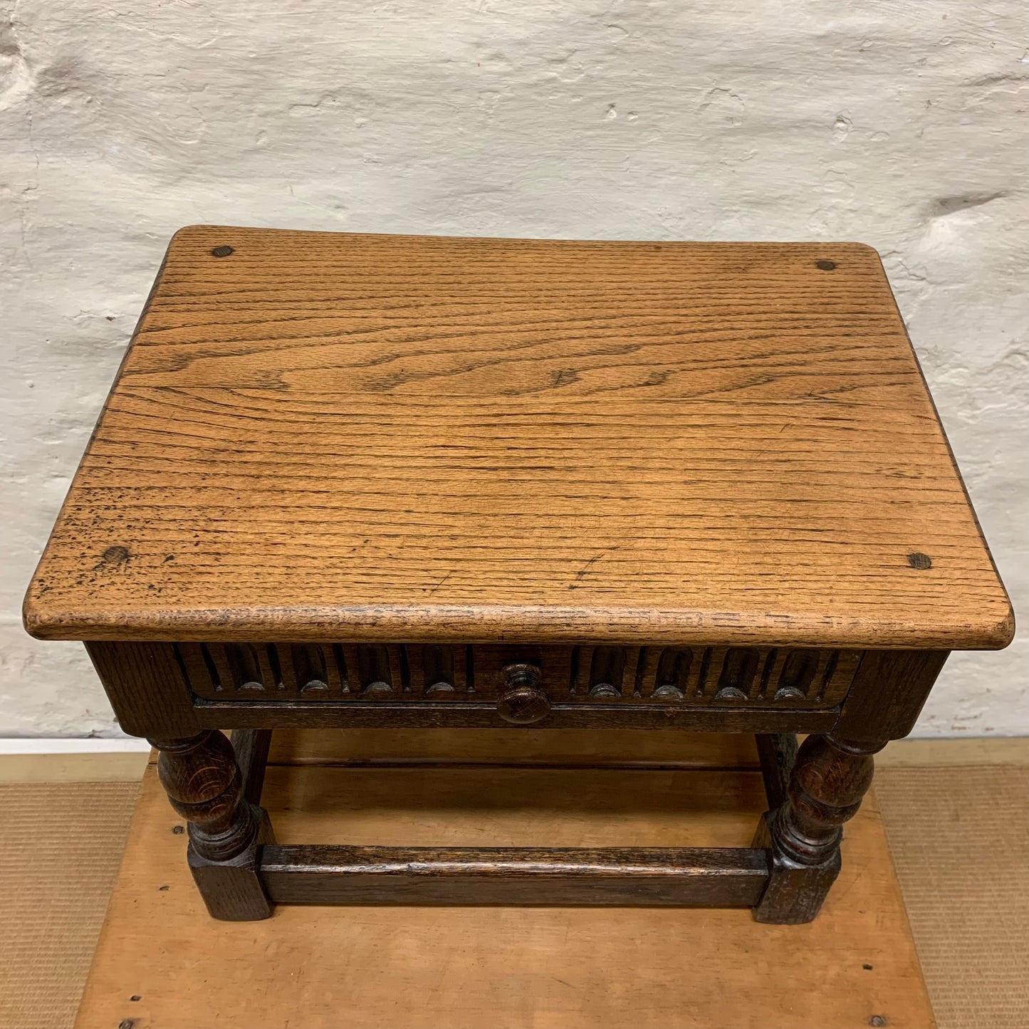A Solid Oak Stool with Drawer
